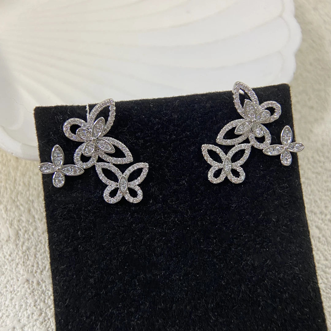 The 925 silver women's jewelry collection includes classic butterfly earrings, butterfly bracelets, and butterfly necklaces.