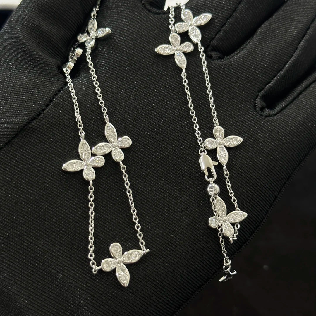 The 925 silver women's jewelry collection includes classic butterfly earrings, butterfly bracelets, and butterfly necklaces.